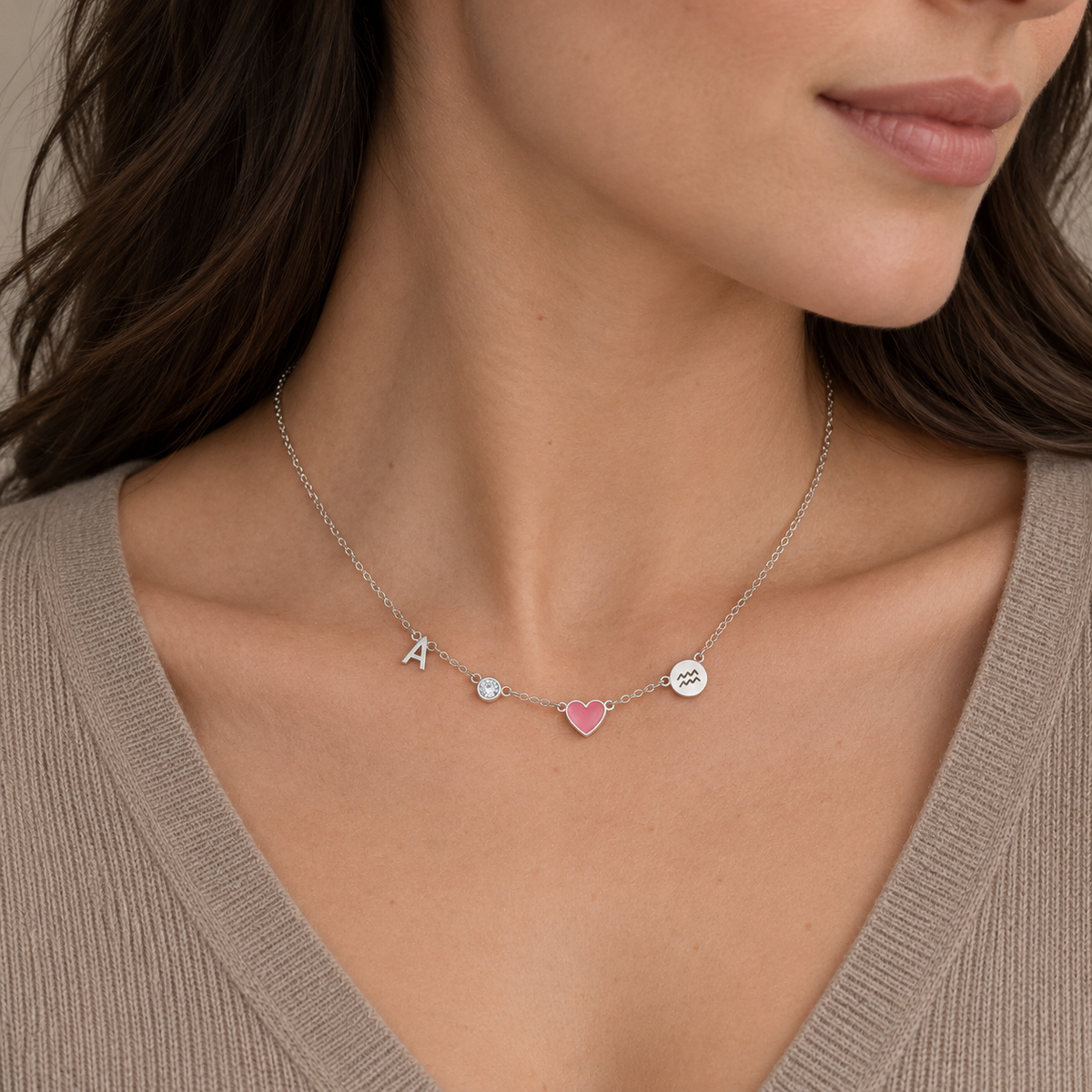 Collana Cuore Norelia in argento con iniziale A, pietra chiara, cuore rosa e Acquario
