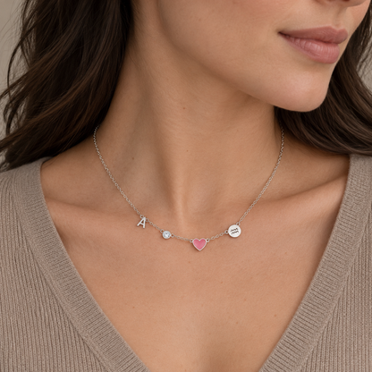 Collana Cuore Norelia in argento con iniziale A, pietra chiara, cuore rosa e Acquario