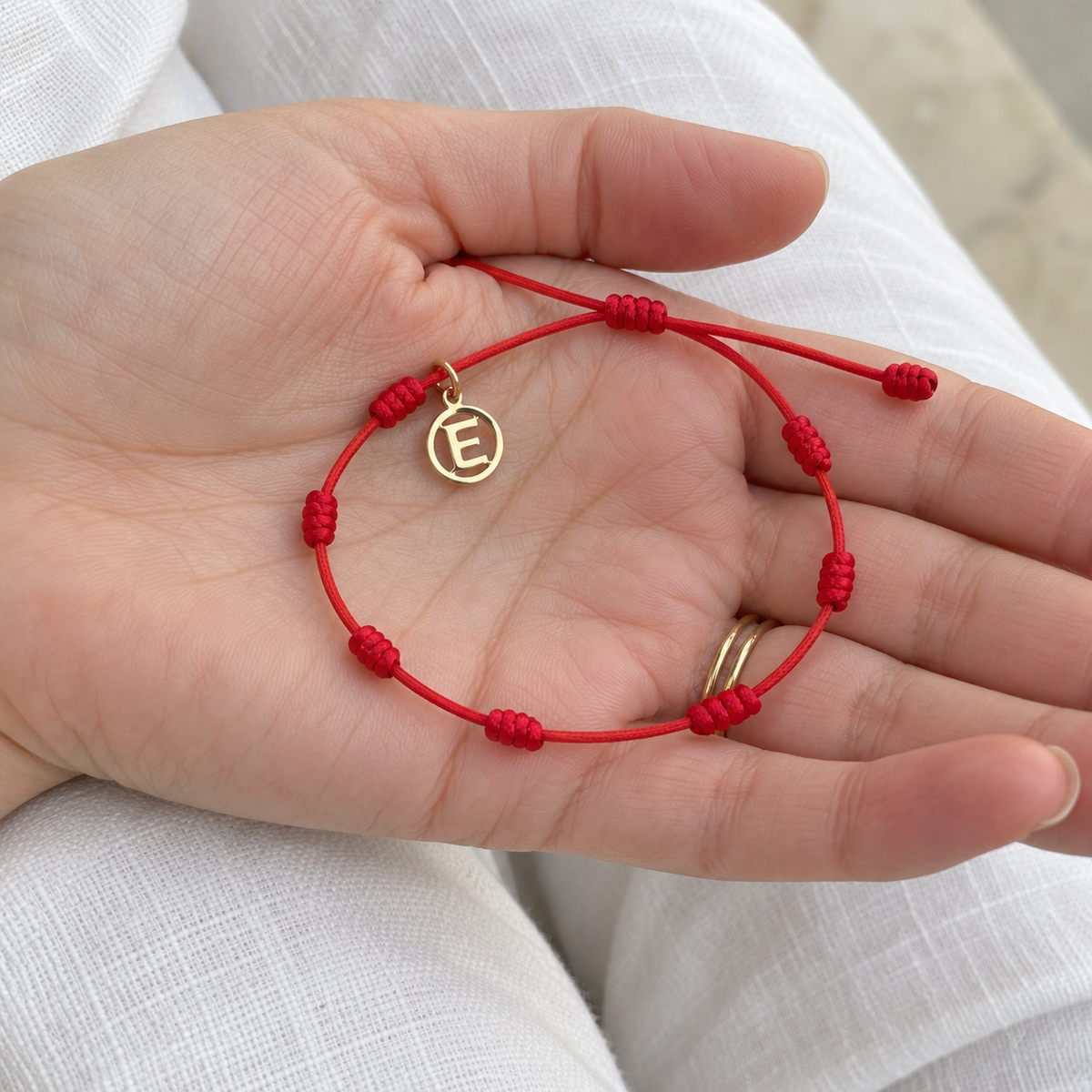 Bracciale Rosso 7 Nodi — Iniziale E