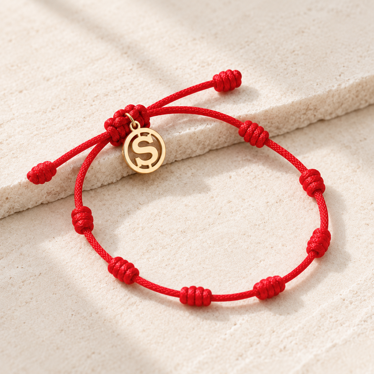 Bracciale Rosso 7 Nodi — Iniziale S
